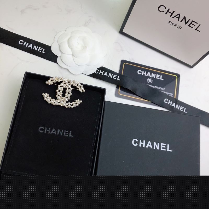 Ch*el brooches